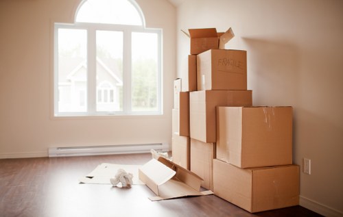 Loading furniture into a moving van in Rainham