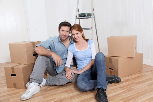 Team handling furniture during a domestic move in Rainham