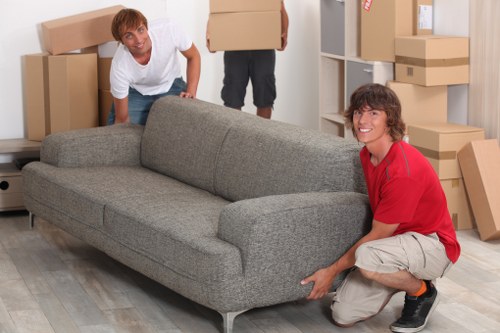 Professional movers assisting a Rainham household relocation