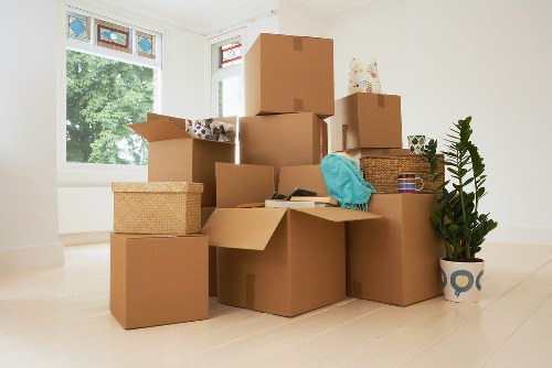 Packed boxes and furniture ready for local removals