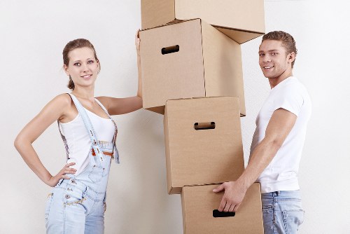 Packed boxes and furniture ready for a house move in Rainham